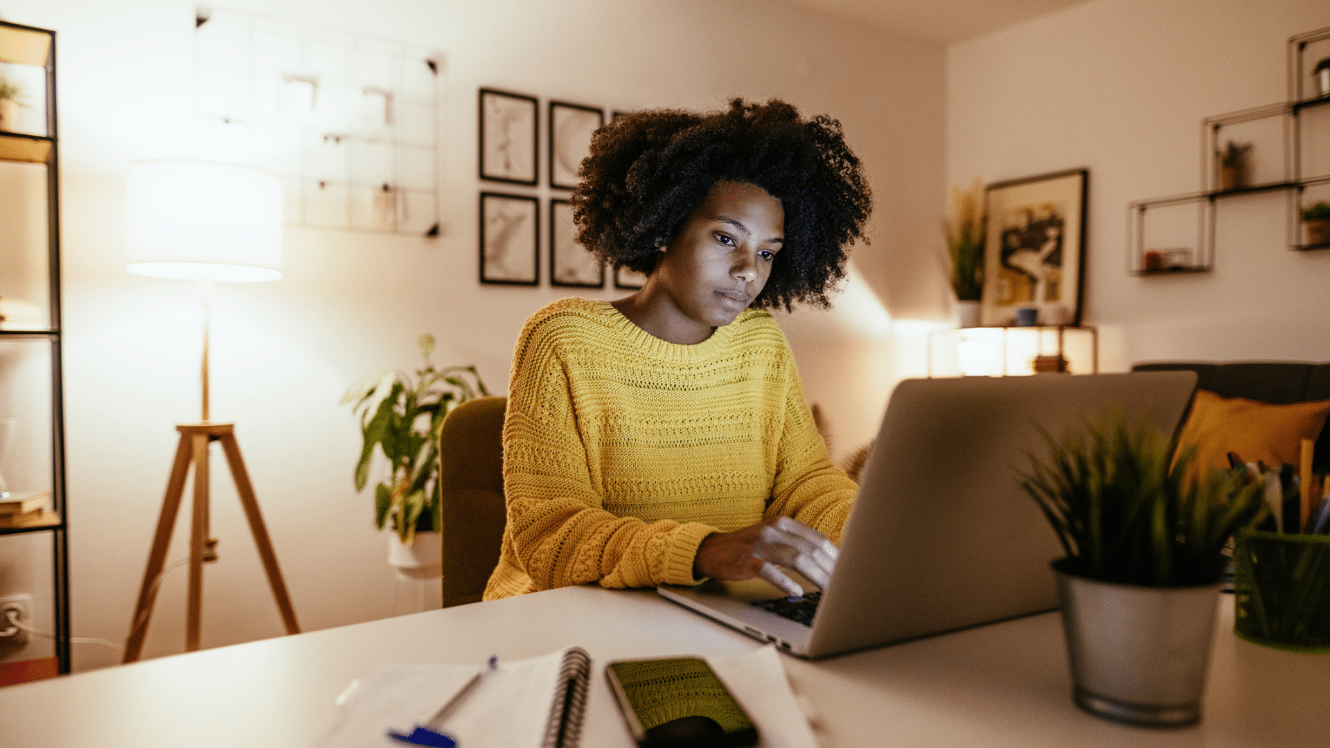 A remote employee logs into an online leadership coaching session.